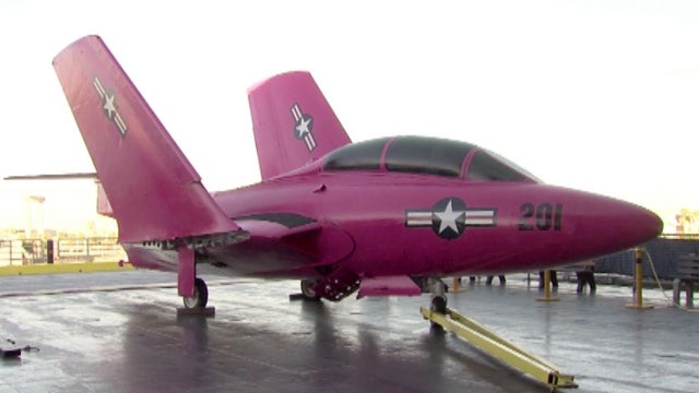 Retired Navy jet goes pink for war on breast cancer