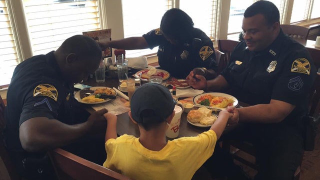 6-year-old boy asks to pray with St. Pete police officers