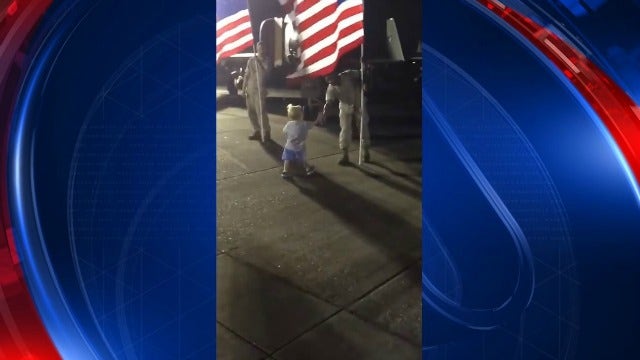 Little boy shakes hands of those who serve