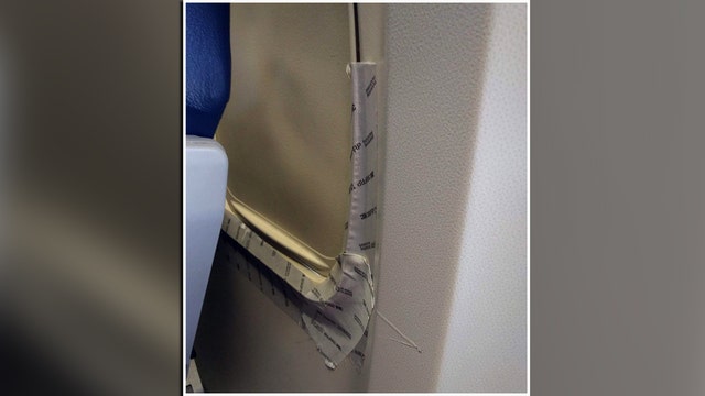 Airline uses tape to repair 'cosmetic' window damage