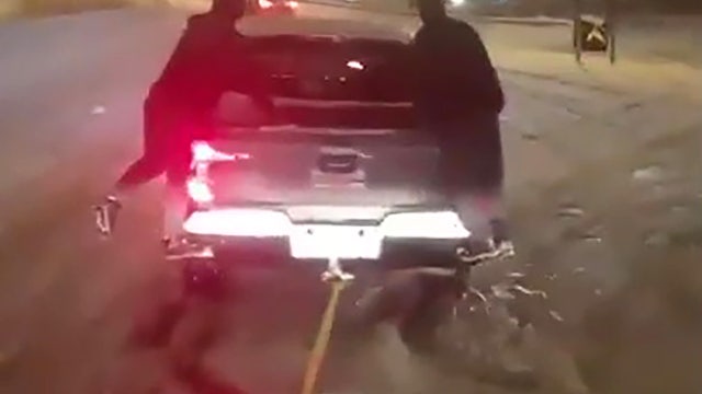 Pickup truck pulls 18-wheelers stuck on icy Missouri highway