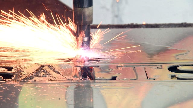 Lasers, sparks, and creativity: Father-son duo makes custom art