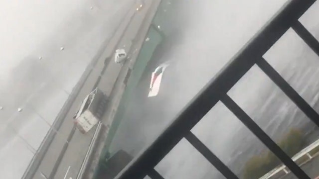 Strong typhoon slams western Japan; 8 dead, airport flooded