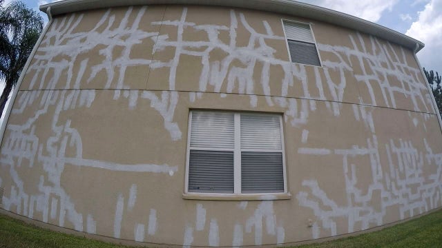 FOX 13 Investigates: Homeowners say builder is sticking them with stucco problems