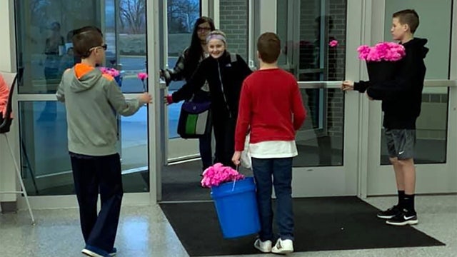 Boys buy flowers for every girl at their middle school for Valentine's Day