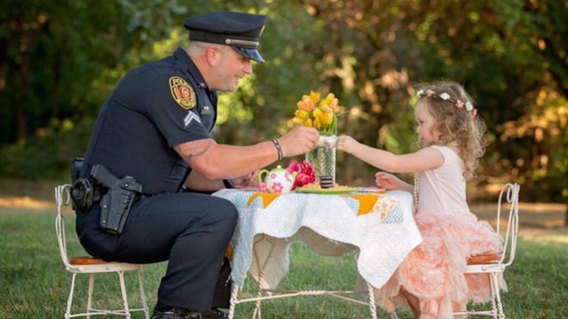 Rowlett officer has tea with the toddler he saved