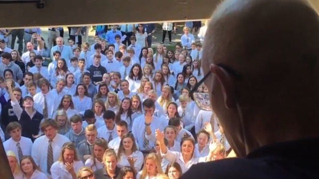 Hundreds of students serenade beloved teacher battling cancer