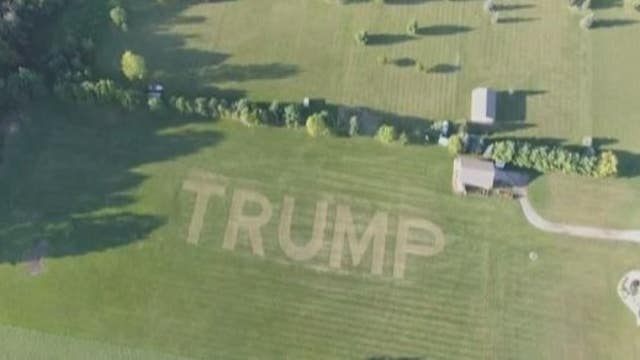 Massive Trump sign mowed into lawn