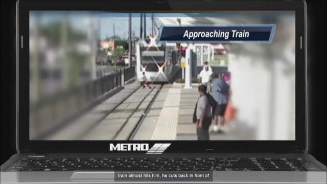 Child's close call with a METRO rail train captured on video