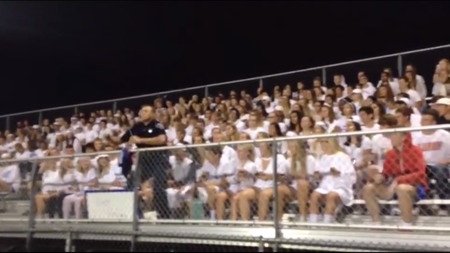 High school security officer's football game cheer goes viral