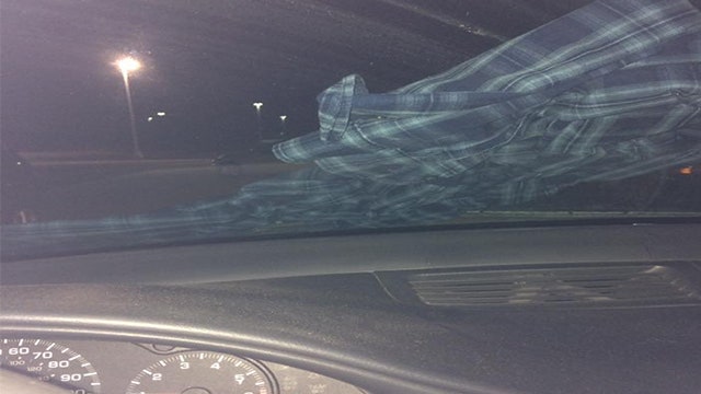 Woman's warning about shirt wrapped around windshield goes viral