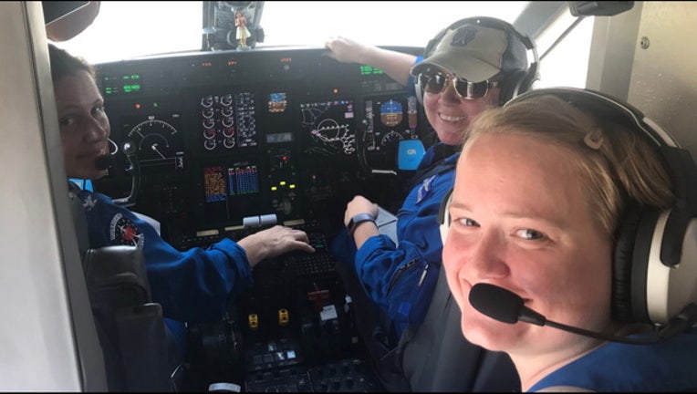 54e0b1f3-NOAA female flight crew EDKC69hU8AEyp8E_1567132685840.jpg