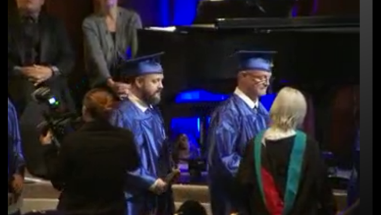 43fd6806-FatherSonGraduates_1481417496442.PNG