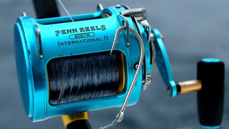 c774b355-GETTY fishing rod handle_1522788609463.png-402429.jpg