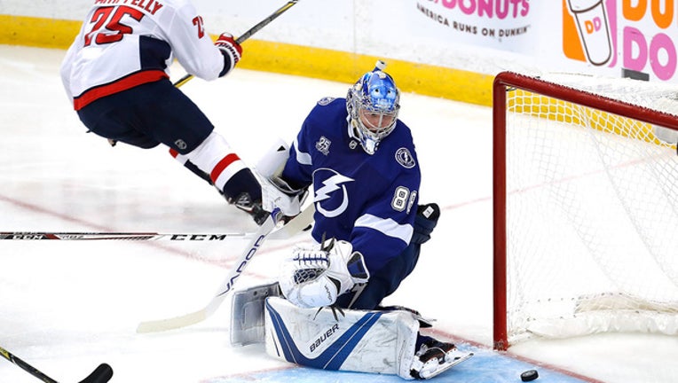 e53bdb53-GETTY lightning fall to capitals game 2_1526293127766.jpg.jpg