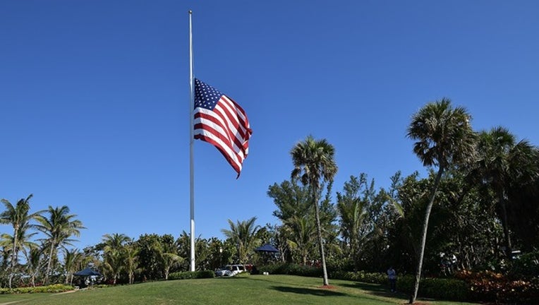 9c08f641-GETTY_flag half staff mar a lago_080419_1564953998995.png-402429.jpg
