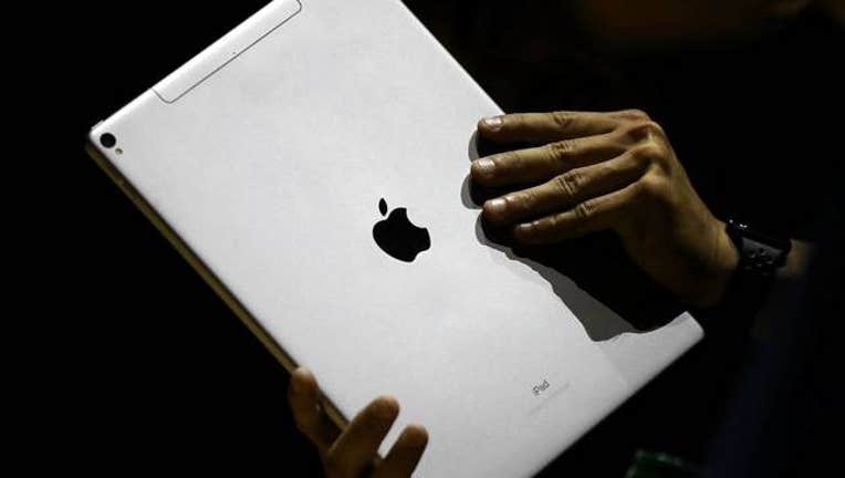 0c327ae2-Getty Apple iPad_1554811378388.jpg-408200.jpg