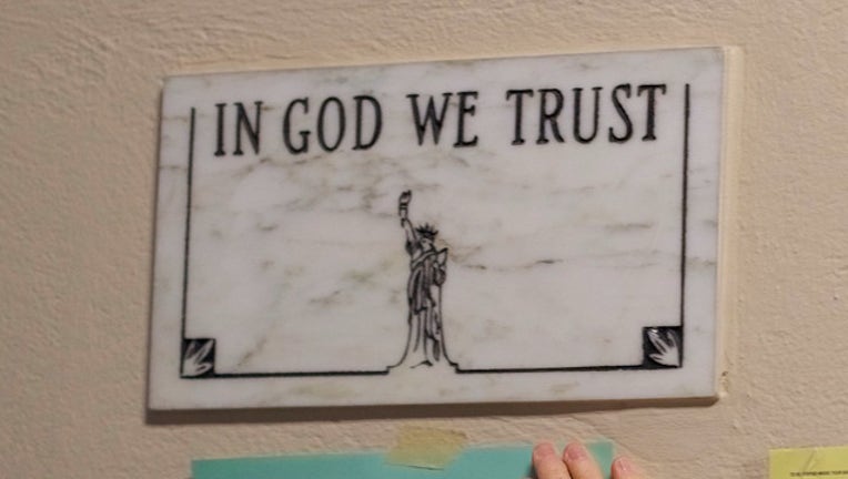 IN GOD WE TRUST GETTY_1533828637323.jpg-403440.jpg