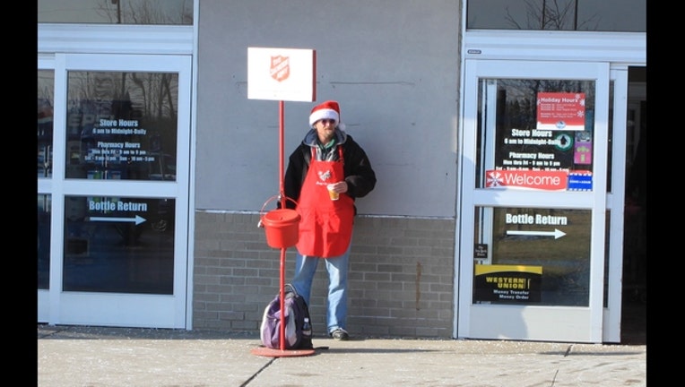 d547c0f3-Salvation_Army_red_kettle_at_supermarket_entrance_Ypsilanti_Michigan_1448925953597.JPG