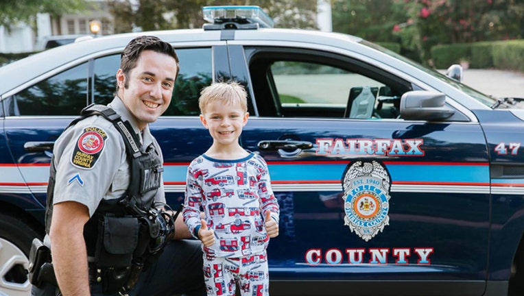 e9f9d629-Police surprise boy at his birthday party-401720
