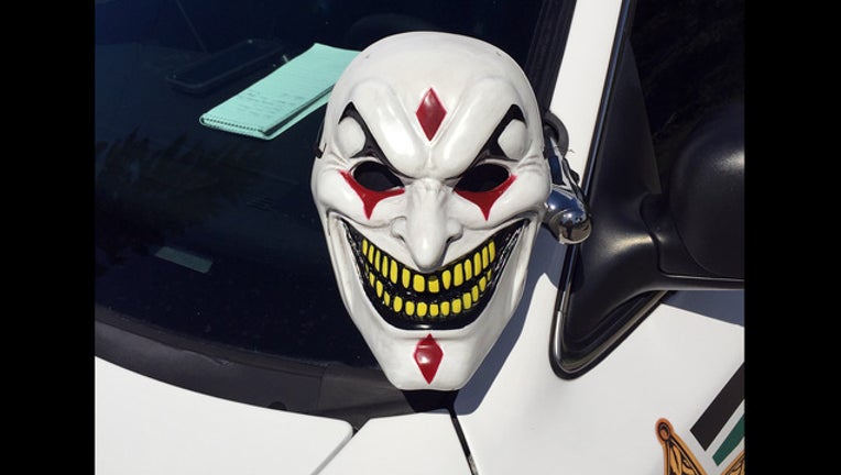 548d80f1-clown mask Pasco_1475518171129.JPG