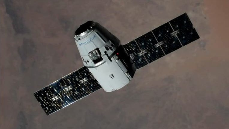 3e221197-dragon in space_1502887889128.jpg