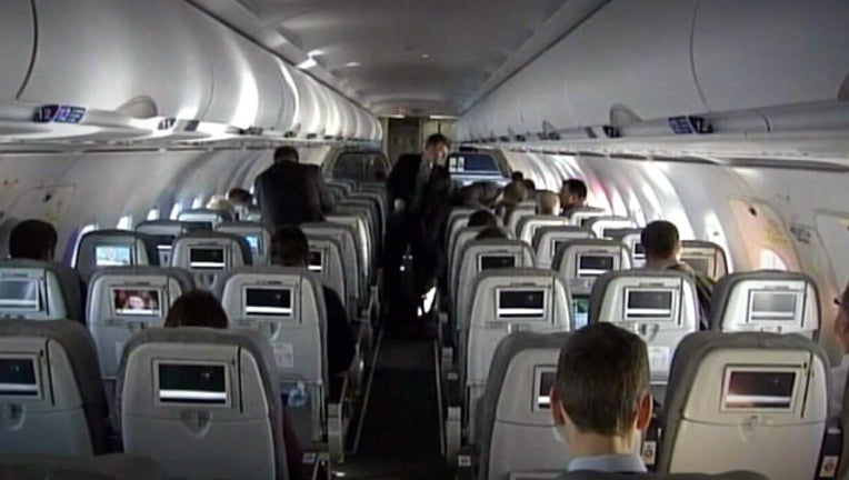 e9495548-inside airplane_1447794567516.jpg