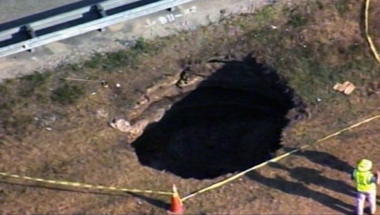 7fcc19a1-interstate-4-sinkhole_1493333012338-402429.jpg