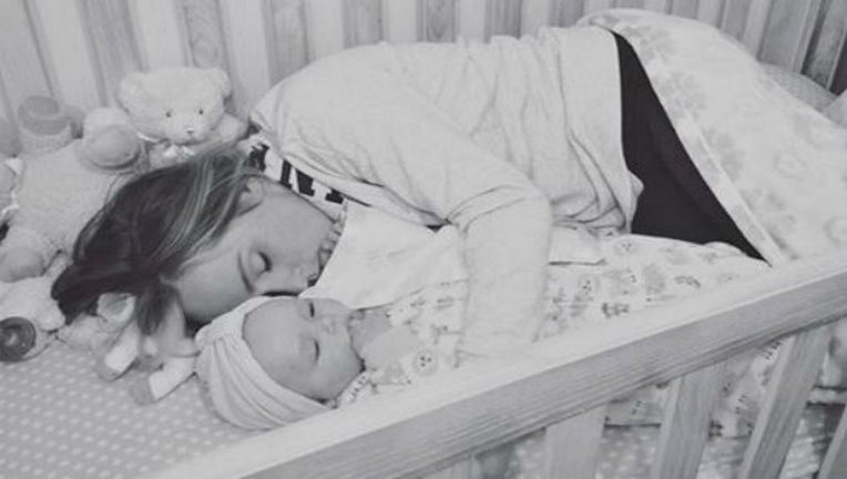 5516f996-mom in crib_1460404186438-404959.JPG