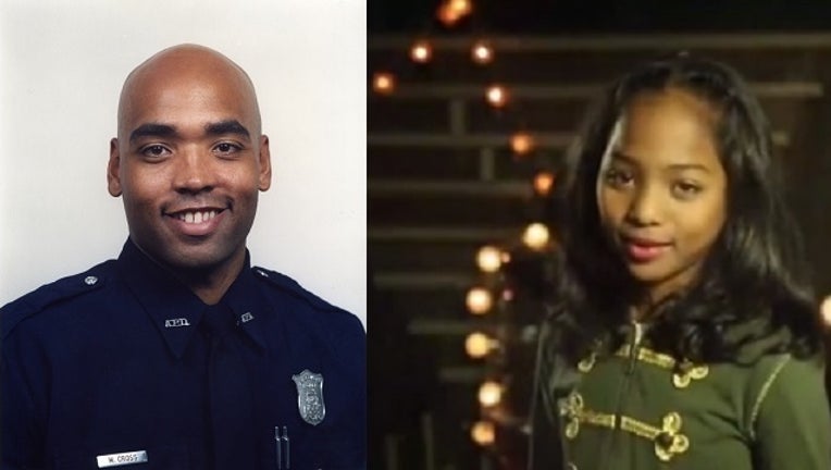 3c8b663d-officer cross and daughter_1445639666416-404959.jpg