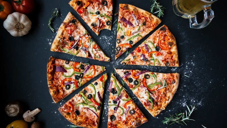 334225da-pizza stock photo_1525778656360.jpg.jpg