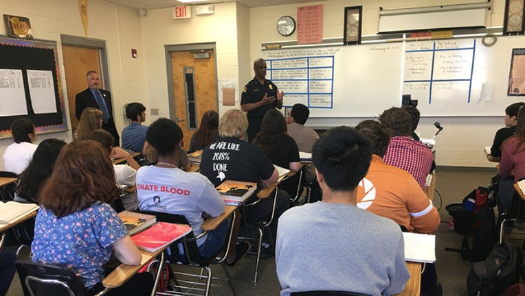 0224f1e2-st pete police in classrom_1519330240416.jpg.jpg