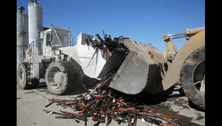 d24aa21b-thousands of guns_1469311137442-407068.jpg