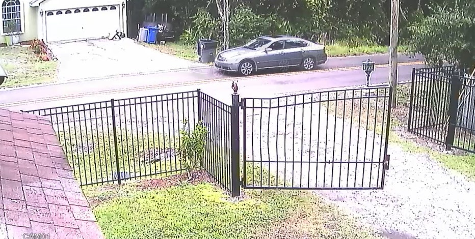 Suspect caught on camera with gas canister after bodies found inside burning home