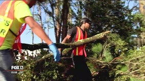 Polk County inmates help residents with tornado cleanup