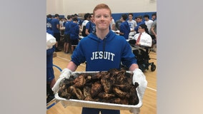 Jesuit students package thousands of meals at Metro Ministries