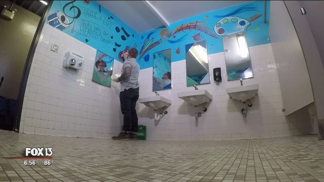 Tattoo artist transforms school bathrooms in Lakeland