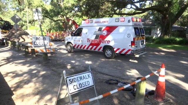 Worker hospitalized after falling into trench