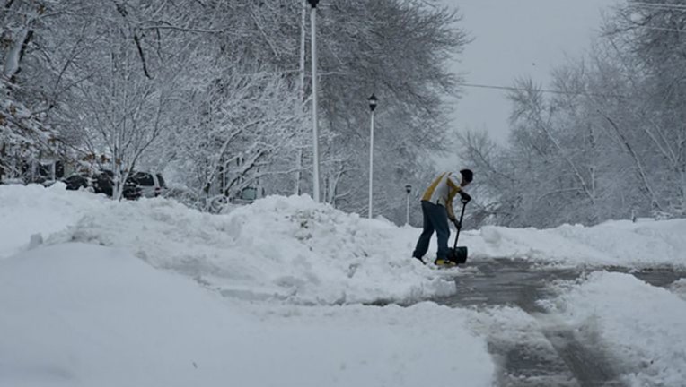 22e24b56-Shoveling-snow-photo_1570934793557.jpg