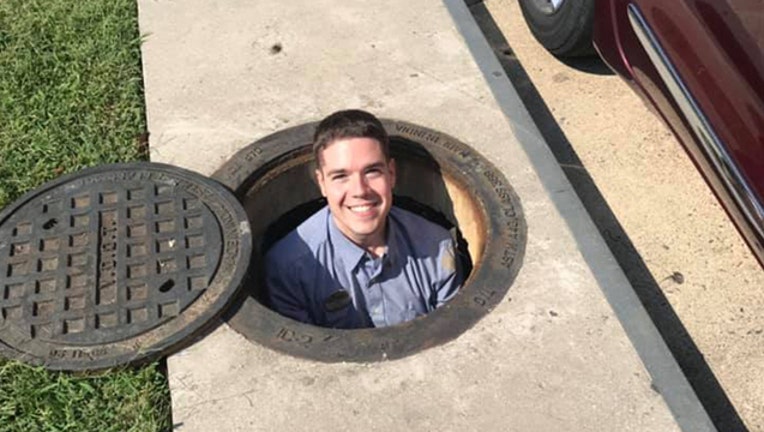 ad93ba9a-chick-fil-a employee in storm drain_1570439924814.jpg.jpg