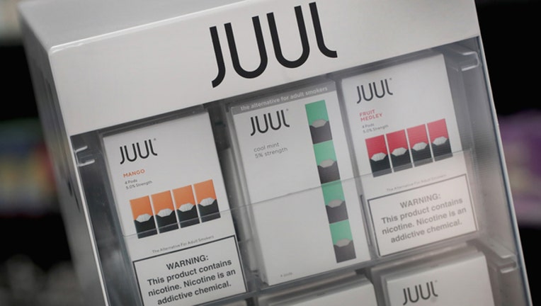 Electronic cigarettes and pods by Juul, the nation's largest maker of vaping products, are offered for sale at the Smoke Depot on September 13, 2018 in Chicago, Illinois. The Food and Drug Administration (FDA) has ordered e-cigarette product makers to devise a plan to keep their devices away from minors, declaring use by teens has reached an 