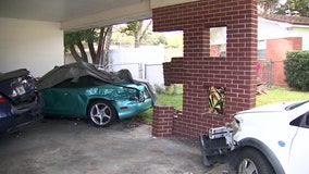 Truck plows into Lakeland carport, drives away