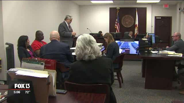 Judge punts decision on dispute over search of defendant's cell phone