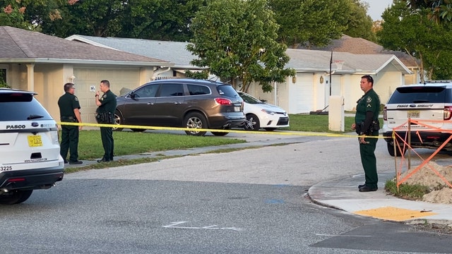 Deputies find burned car with body inside in wooded are of Pasco County