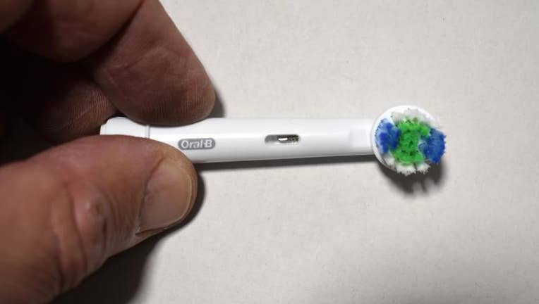 One of the counterfeit toothbrush heads that was seized is displayed.
(U.S. Customs and Border Protection)