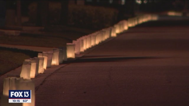 Luminaries light the way for neighborhood fellowship - and Santa - in Apollo Beach