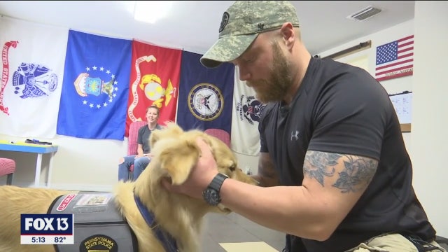 Injured trooper receives 'new family member': A service dog