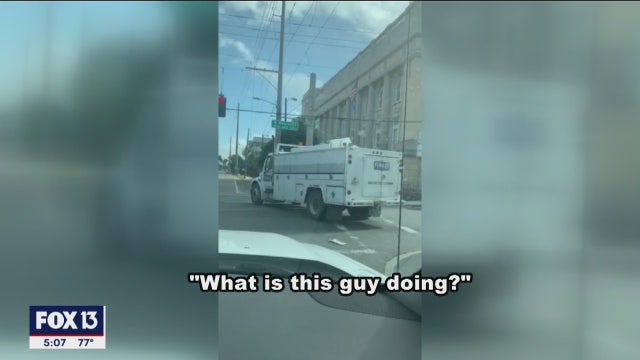 Bystander hops into driverless truck to prevent crash