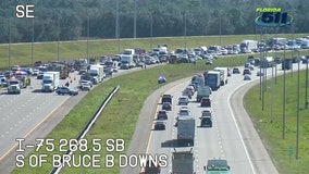 Woman dies after slamming into truck on I-75