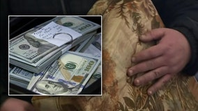 Man returns $43,000 he found in couch he bought from Michigan thrift store